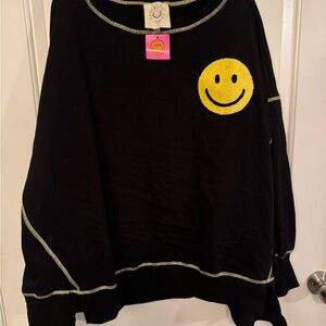 Black smiley oversized pullover